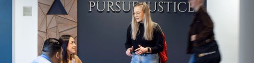 Law students in the Arc of Justice Atrium