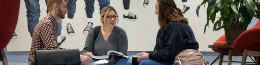 Law students studying in the Arc of Justice Atrium