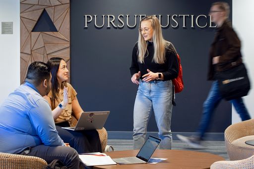 Law students in the Arc of Justice Atrium