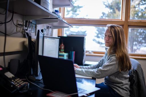 Oceanography PhD student Bailey Avila working in the lab
