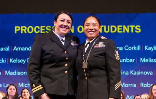 Two students at nursing pinning ceremony.