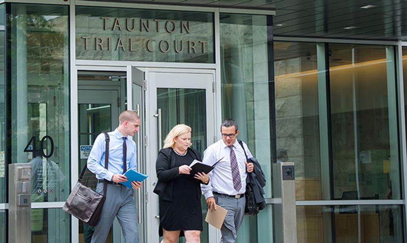 Students and alum outside Taunton Trial Court