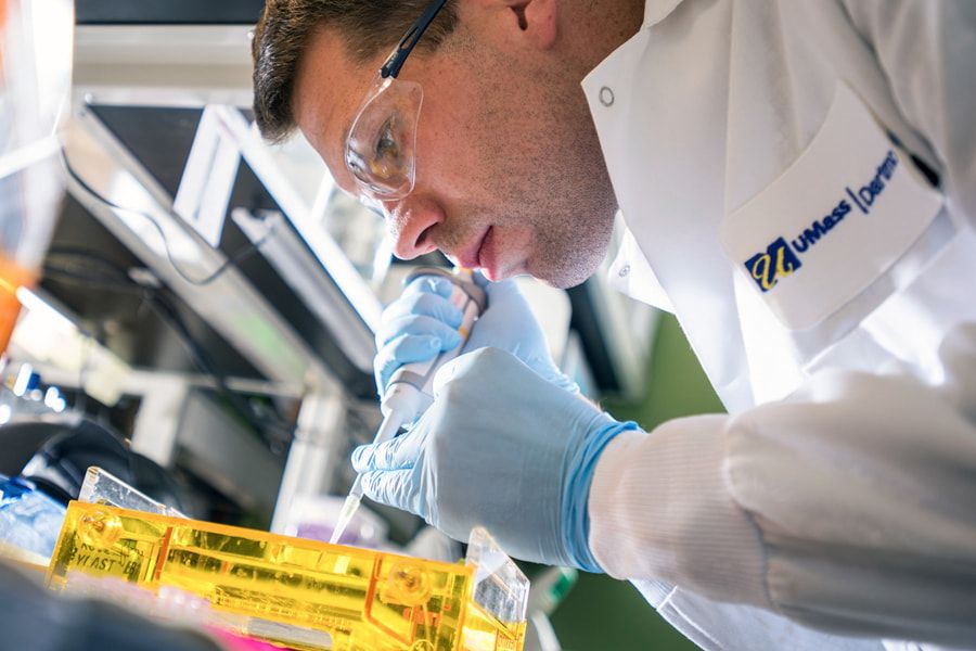 UMassD chemistry student in the laboratory
