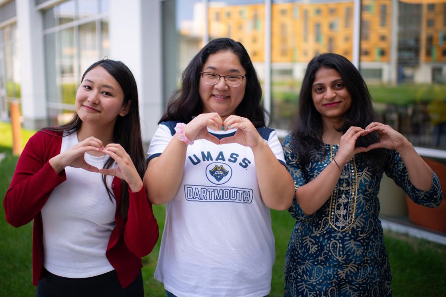 Group of UMassD students posing with heart hands