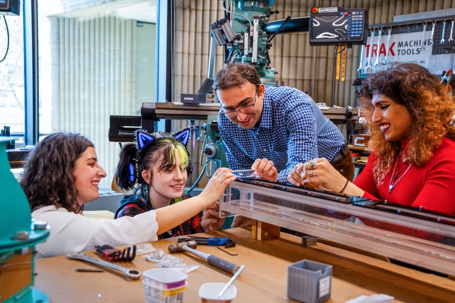 Mechanical Engineering students, working on capstone projects, in the machine shop.