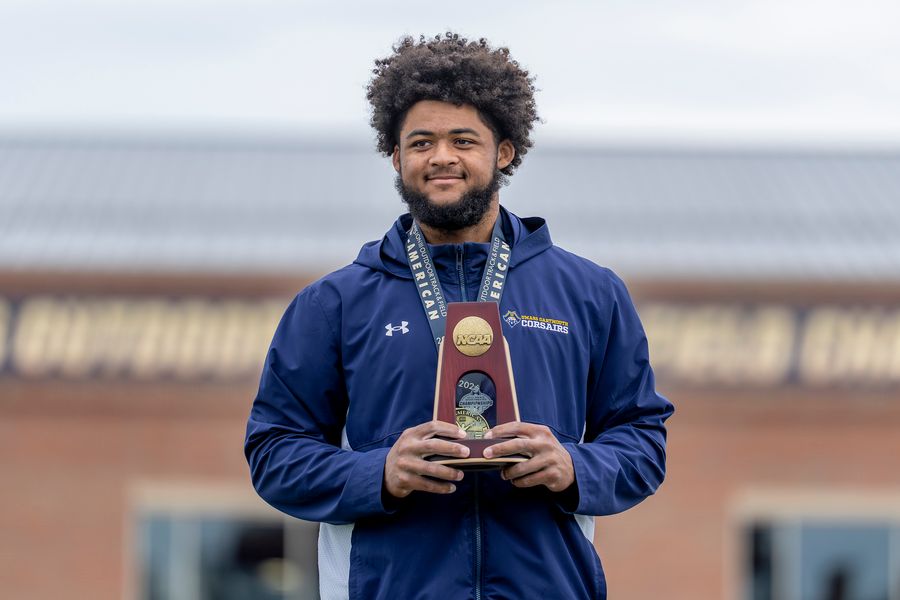 Ancil Alexander pictured with his All-American medal and trophy at the 2026 Track & Field National Championships