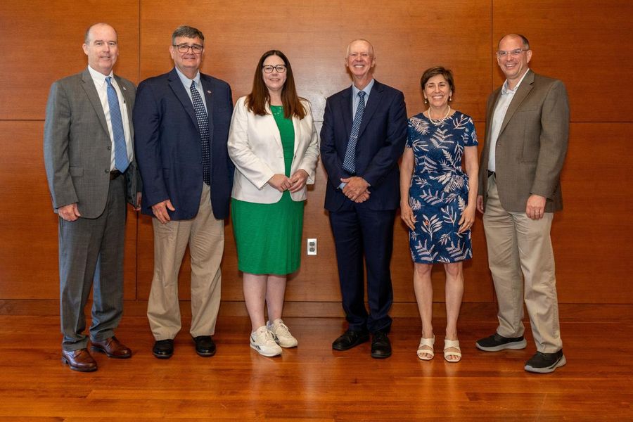 Group shot of university and state officials at a grant announcement