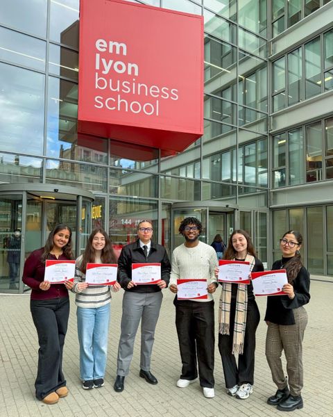Six Charlton College of Business students pictured outside emlyon business school in Lyon, France.