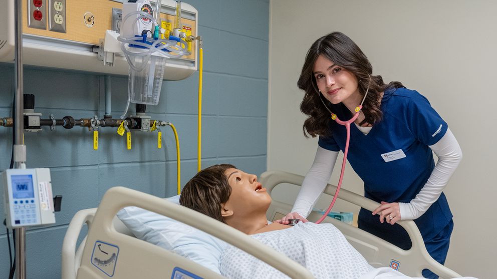 Nursing student in a clinical simulation lab